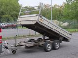 a dump truck that is parked in the parking lot