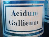 a label on a bottle that says acidum galium