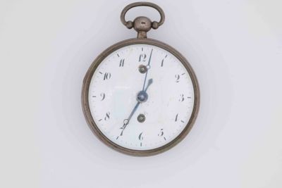 a clock that is hanging on the wall in the room
