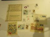 a lot of stamps and postcards on the table