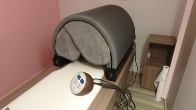 an image of a bed with a headboard on top of it