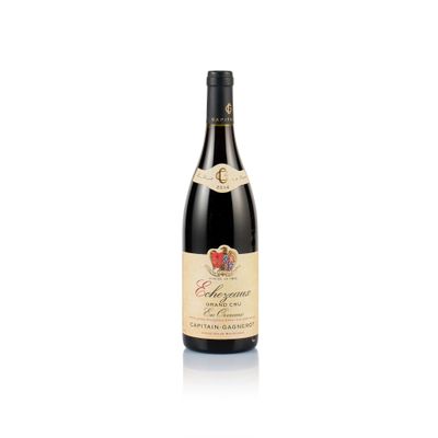 a bottle of red wine on a white background