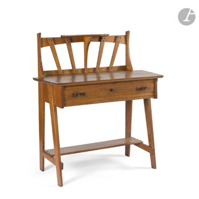 an image of a wooden desk with a drawer underneath it