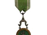 l'image d'une médaille ornée d'un ruban vert sur fond blanc