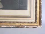 a picture of a man sitting in a chair in a room