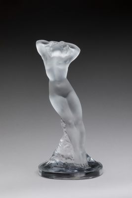 an image of a glass sculpture of a woman on a base