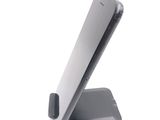 a cell phone that is sitting on top of a stand