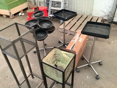 many pots and pans that are sitting on a table
