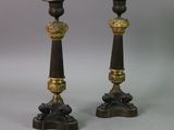 pair of antique brass and bronze candlesticks on marble bases