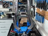 a picture of a workbench in a workshop with tools