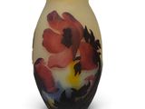 a vase with a floral design on it on a white background