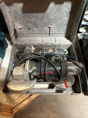 a tool box with tools in it sitting on the floor