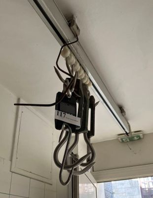 a light that is hanging from the ceiling in the room