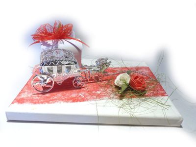 un livre sur lequel figurent une calèche et des roses