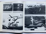 an open book with pictures of a plane on it