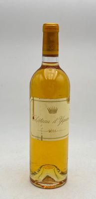 an image of a bottle of wine sitting on top of a table