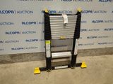 a close up of a ladder in front of a wall