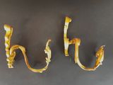 two pieces of banana peel hanging on the wall
