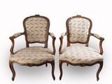 une paire de fauteuils de style Louis II