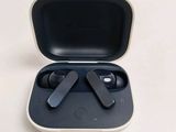 a pair of earphones sitting in a case on a table