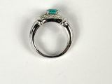 an image of a ring with a turquoise stone