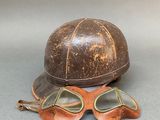 a helmet and goggles sitting on a table