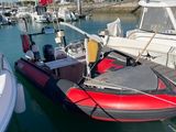 many boats docked in the water at the marina