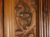 carvings on a wooden door of a house in the philippines
