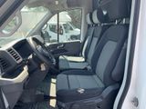 a white van with black seats in the back of it