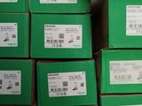 a stack of green boxes that are stacked on top of each other