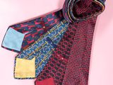 a close up of a neck tie with different patterns on it