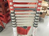 a ladder that is sitting on the floor in a store