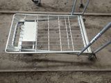 a shopping cart that is sitting on the ground