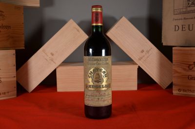 a bottle of wine that is sitting on a table