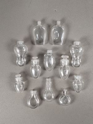 a lot of empty glass bottles sitting on a table