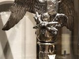 a statue of an eagle with a crown on it ' s head