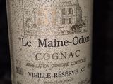 a bottle of wine that is sitting on a table