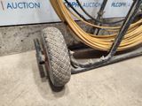 an image of a wheel with a hose attached to it