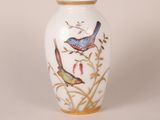 an image of a vase with birds painted on it