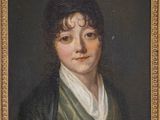 portrait of a young woman in a green dress by person