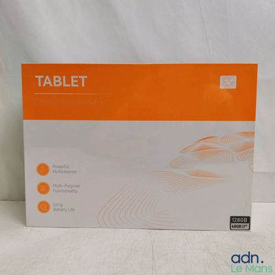 the box of the tablet is sitting on a white surface