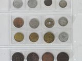 a lot of coins that are in a clear box