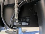 a close up of a cable connected to a computer monitor