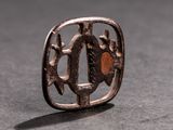 an old silver ring with a picture of a man and a woman on it