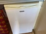 an image of a kitchen with a stove and dishwasher