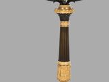 an image of a black and gold candelab with four candles