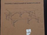 cardboard box with a drawing of a plane on it sitting on a table