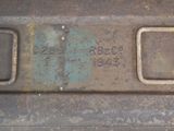 a close up view of a metal plate with numbers on it