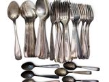 a lot of spoons and spoon spoons on the table