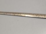 a sword that is laying on a table